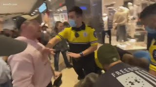 Brawl at the mall Mask protest turns into a melee when police arrive [upl. by Aevin858]