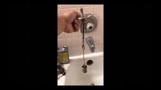 How to Fix a Stuck Drain Stopper in the Bath Tub [upl. by Wing]