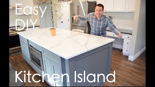 Easy DIY Kitchen Island with seating storage microwave under cabinet marble quartz countertop [upl. by Etnahc]