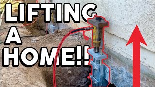 Lifting a homes foundation with Push Piers [upl. by Ketchan716]