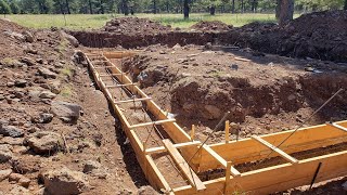 DIY Concrete Forms Forming the foundation footings [upl. by Rapsag94]