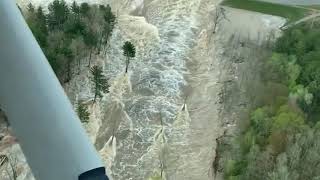 Pilot captures rushing water flowing through failed Edenville Dam [upl. by Laeno765]