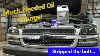 Oil Change on a Duramax LLY Rotella T5 15w40 Synthetic Blend [upl. by Anaitsirc]