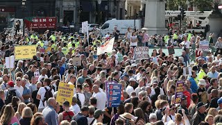 Antivaccine protesters clash with police in London  Coronavirus [upl. by Ttennej]