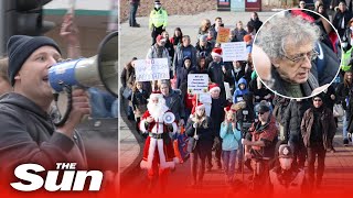 Antilockdown protesters shout at shoppers to remove their masks as demonstrations hit the UK [upl. by Sterling]