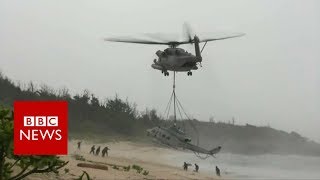 US Marines rescue their helicopter with a bigger one  BBC News [upl. by Gretal468]