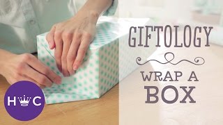 How to Wrap a Box  Giftology [upl. by Atterehs929]